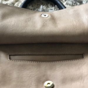 Guess Handbag that will complete any wardrobe.